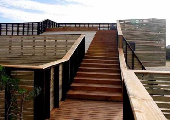 a wooden stairs with railings