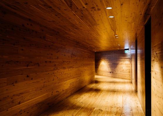a wooden hallway with lights