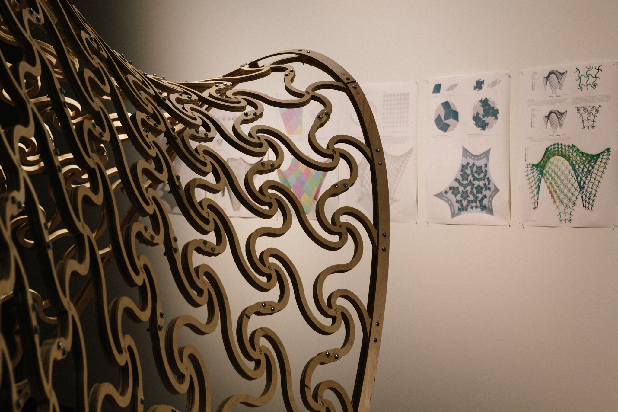 a metal sculpture with a curved design