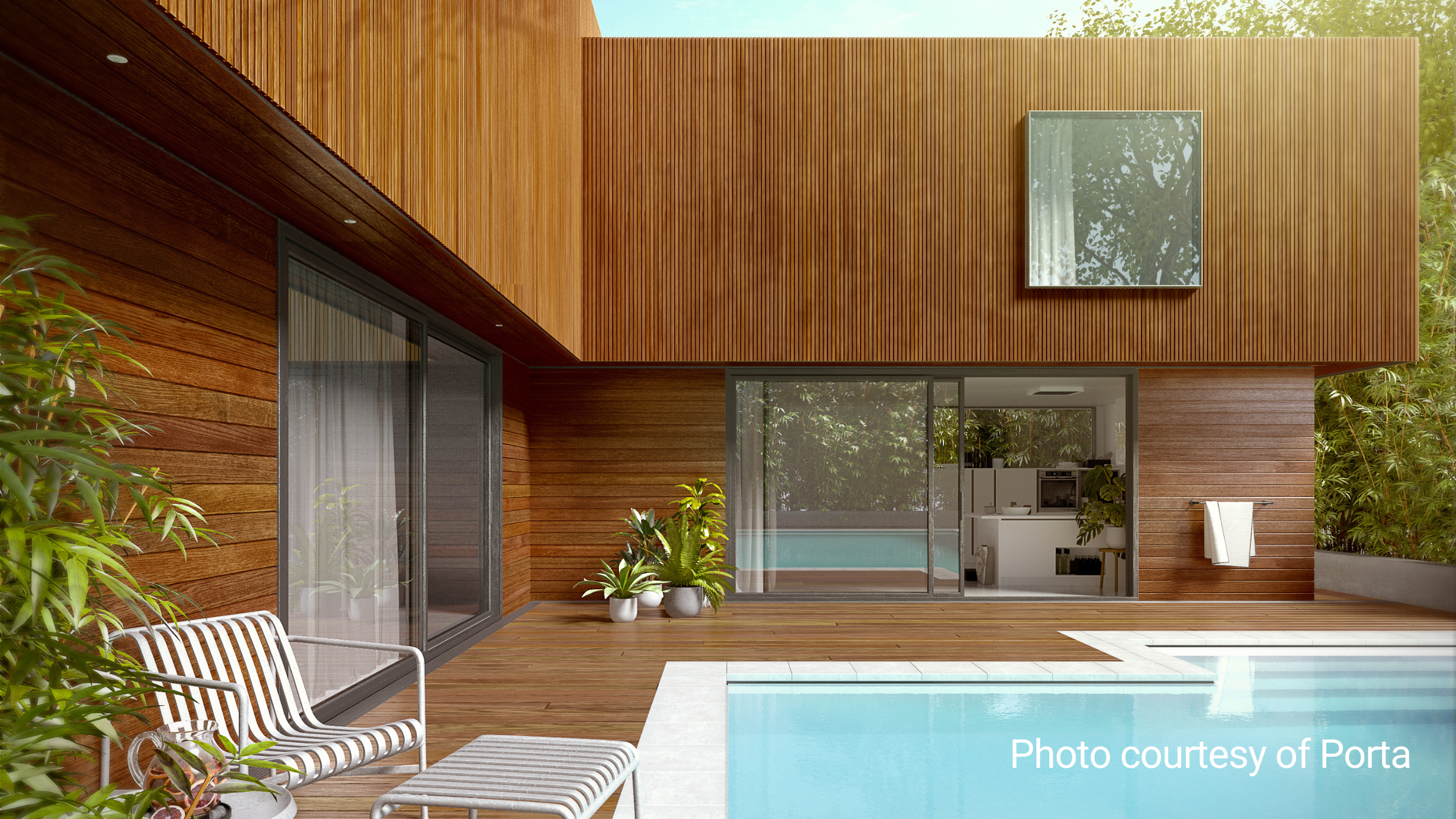 Outdoor view of timber-clad home with swimming pool