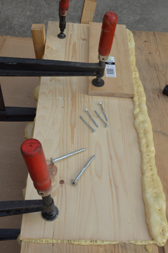 Clamp pressure applied to repaired timber 