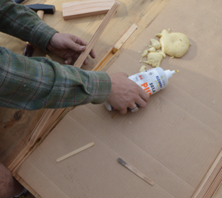 Timber strips bonded to the slot 