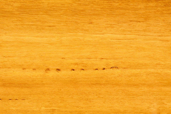 a close up of a wood surface