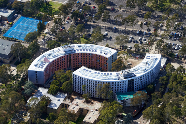 a building with a curved roof