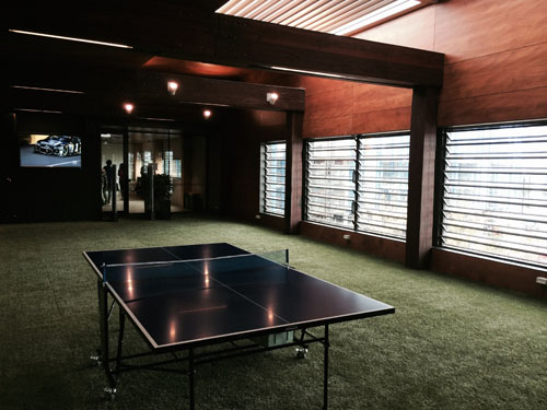 Louvred wall and roof panels create and inside out environment