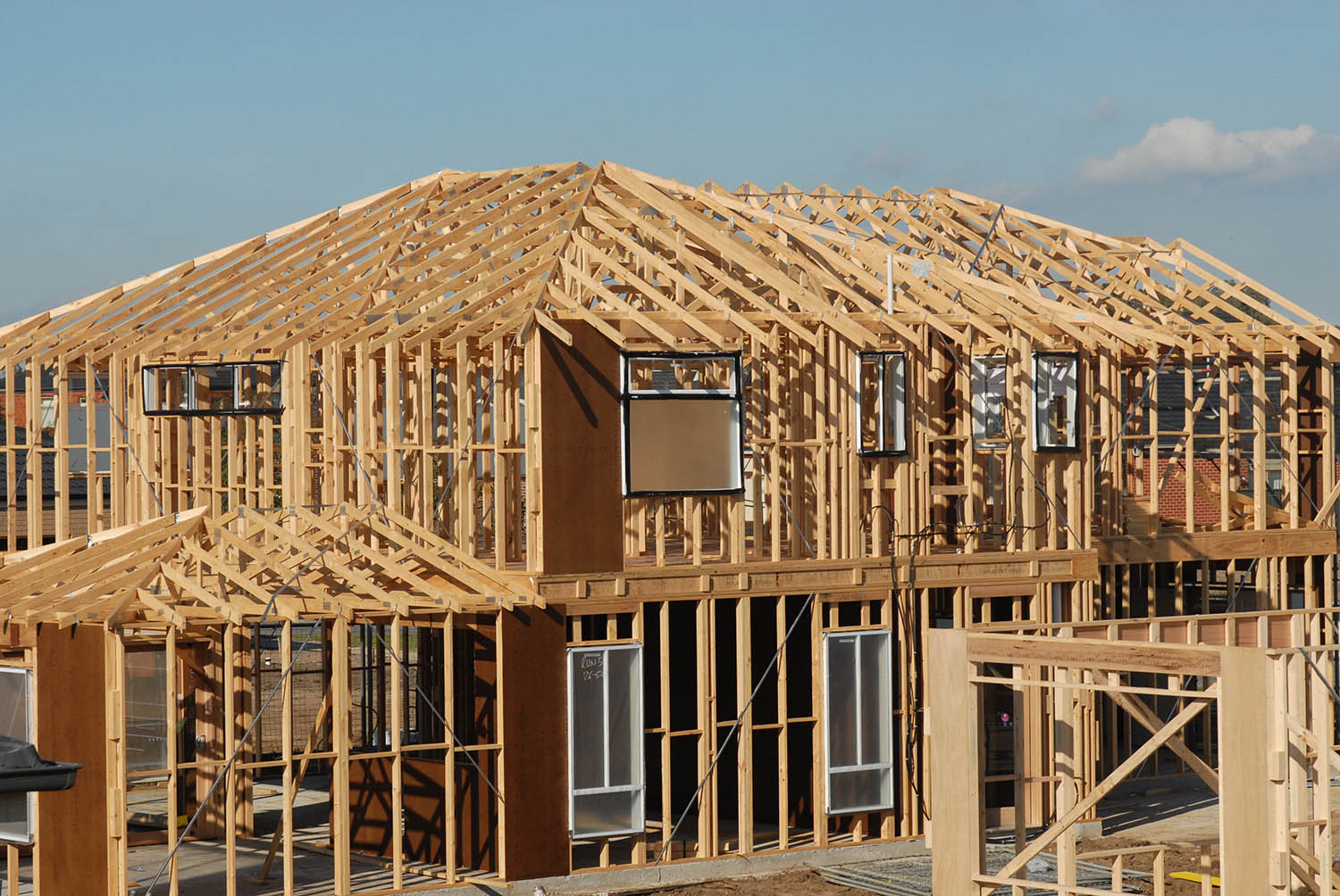 a house under construction with a roof