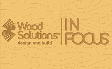 a logo on a wood surface