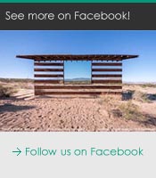 a wooden structure in the desert