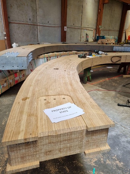 Curved timber elements prior to fit with the steel node. Source: Red Stag TimberLab.