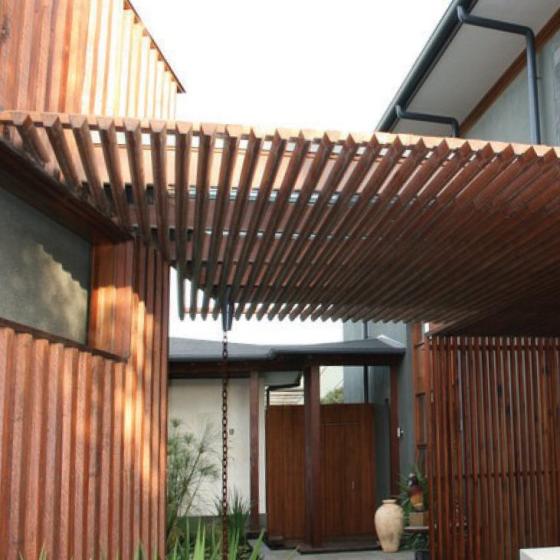 A house using radial sawn timber for cladding and a pergola