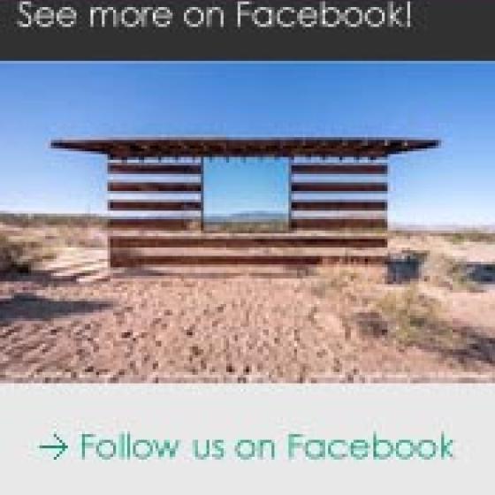 a wooden structure in the desert