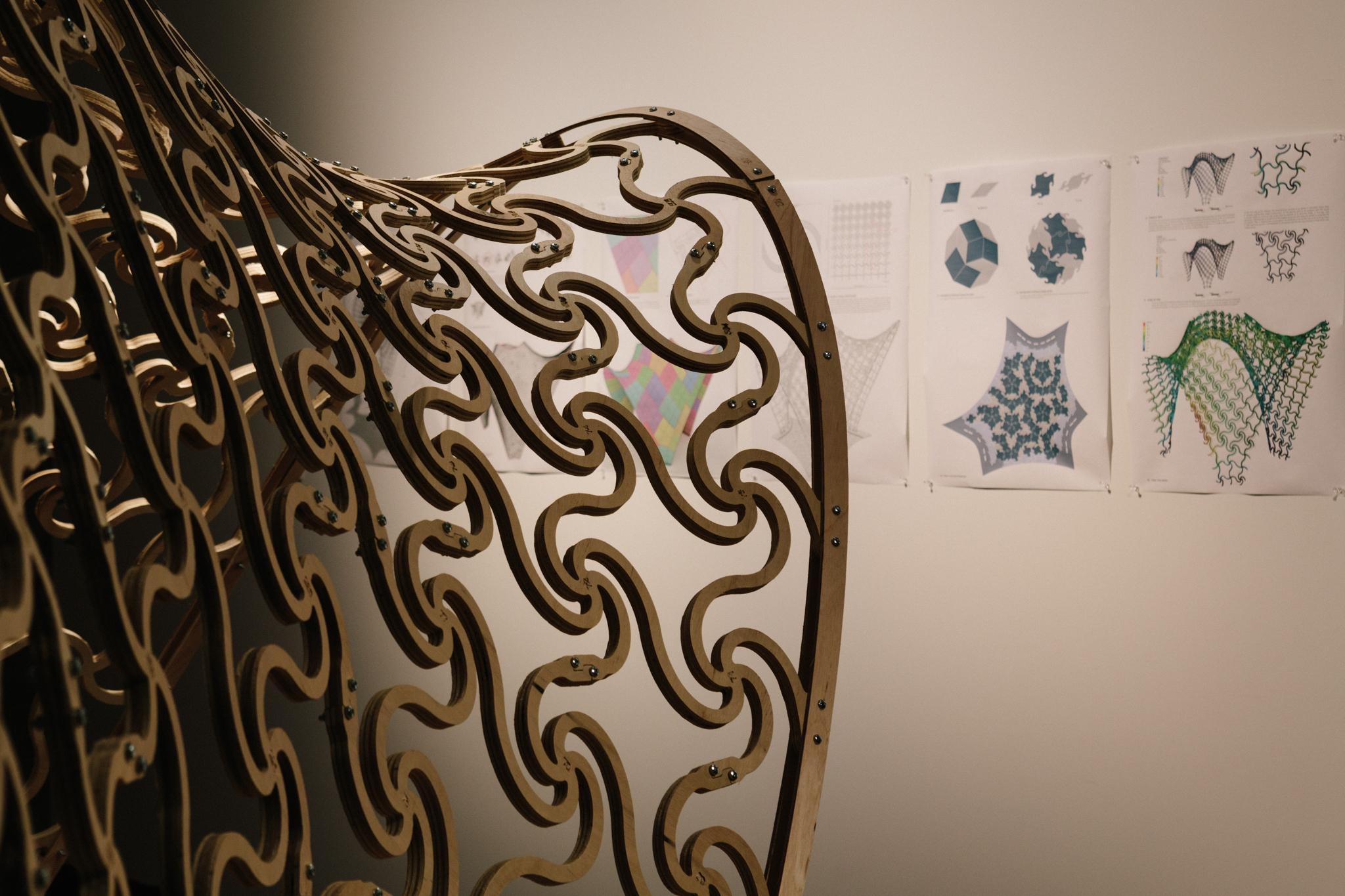 a metal sculpture with a curved design