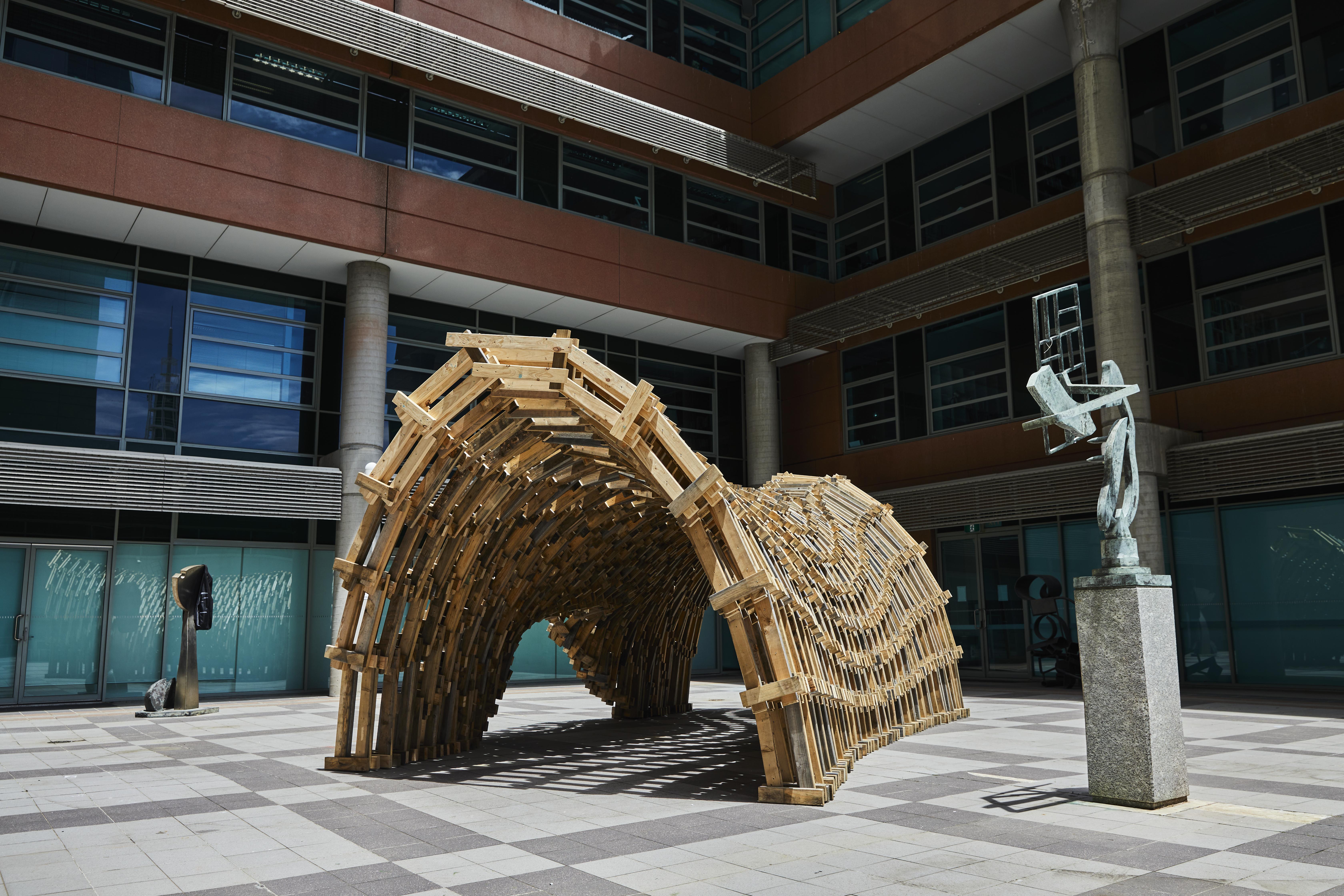 a sculpture outside of a building