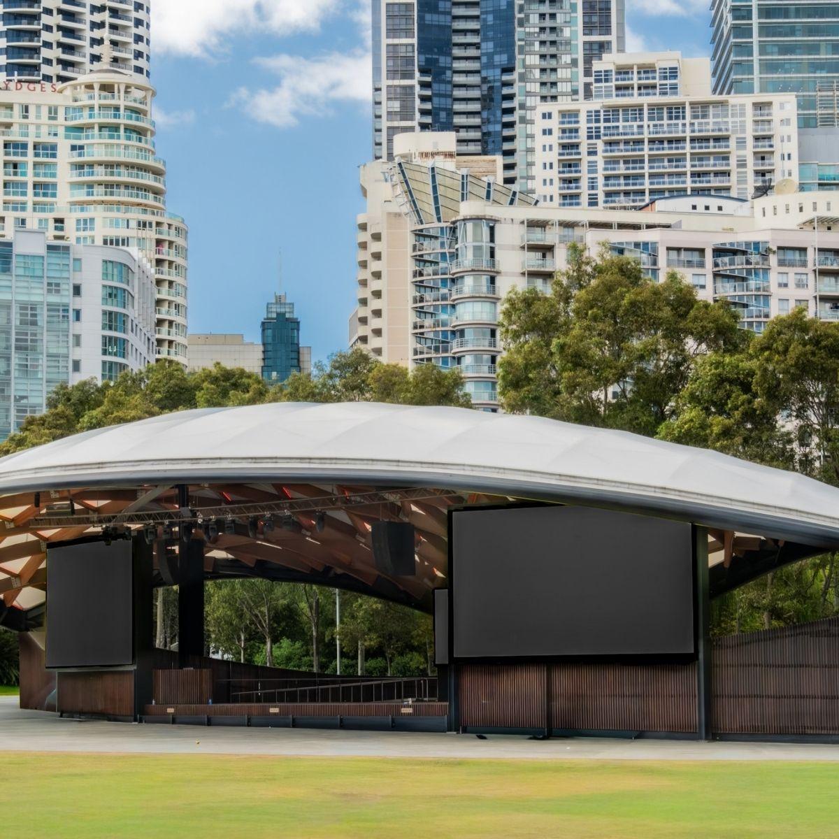 Tumbalong Green Stage against the Sydney city backdrop