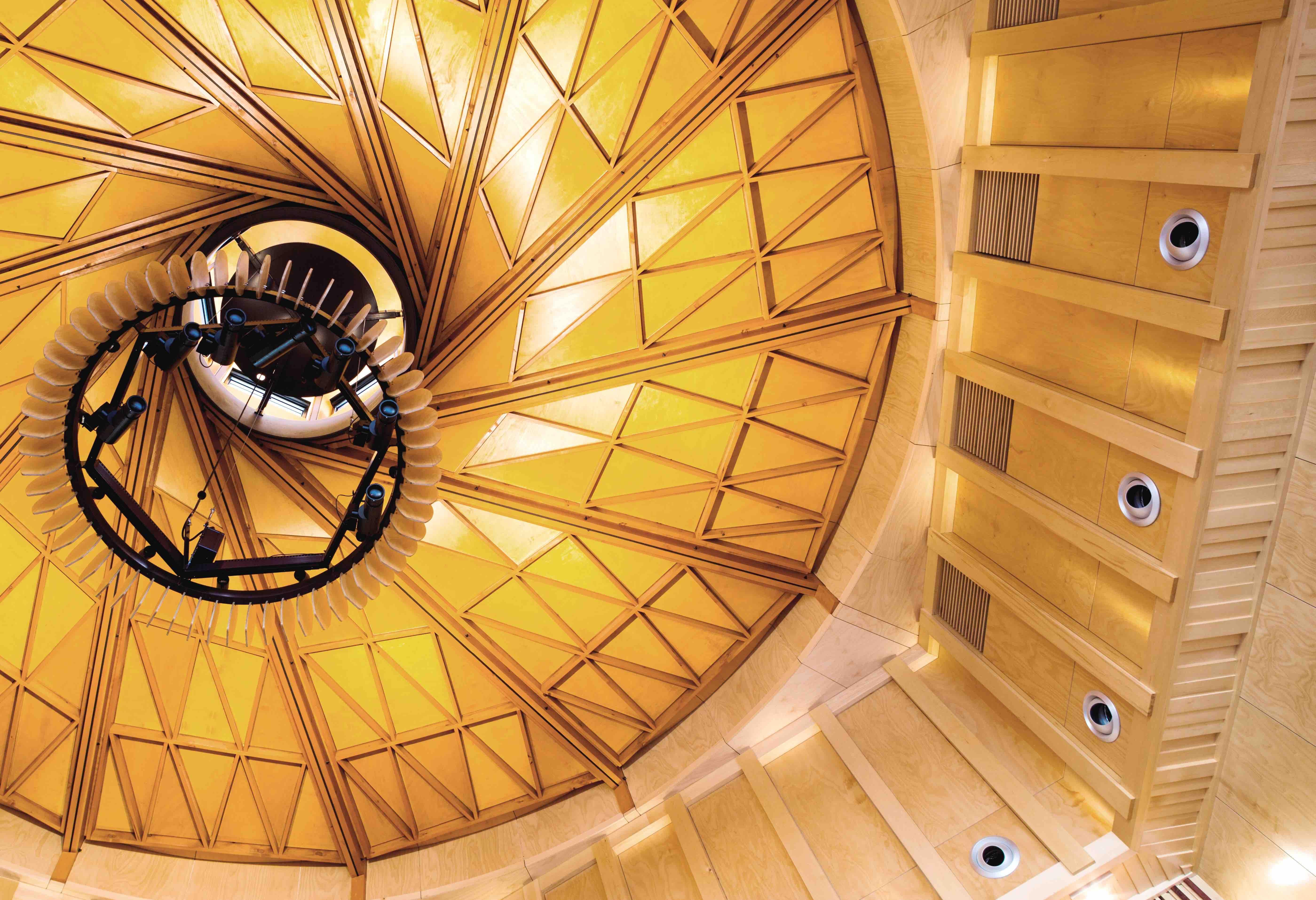a circular ceiling with a spiral staircase