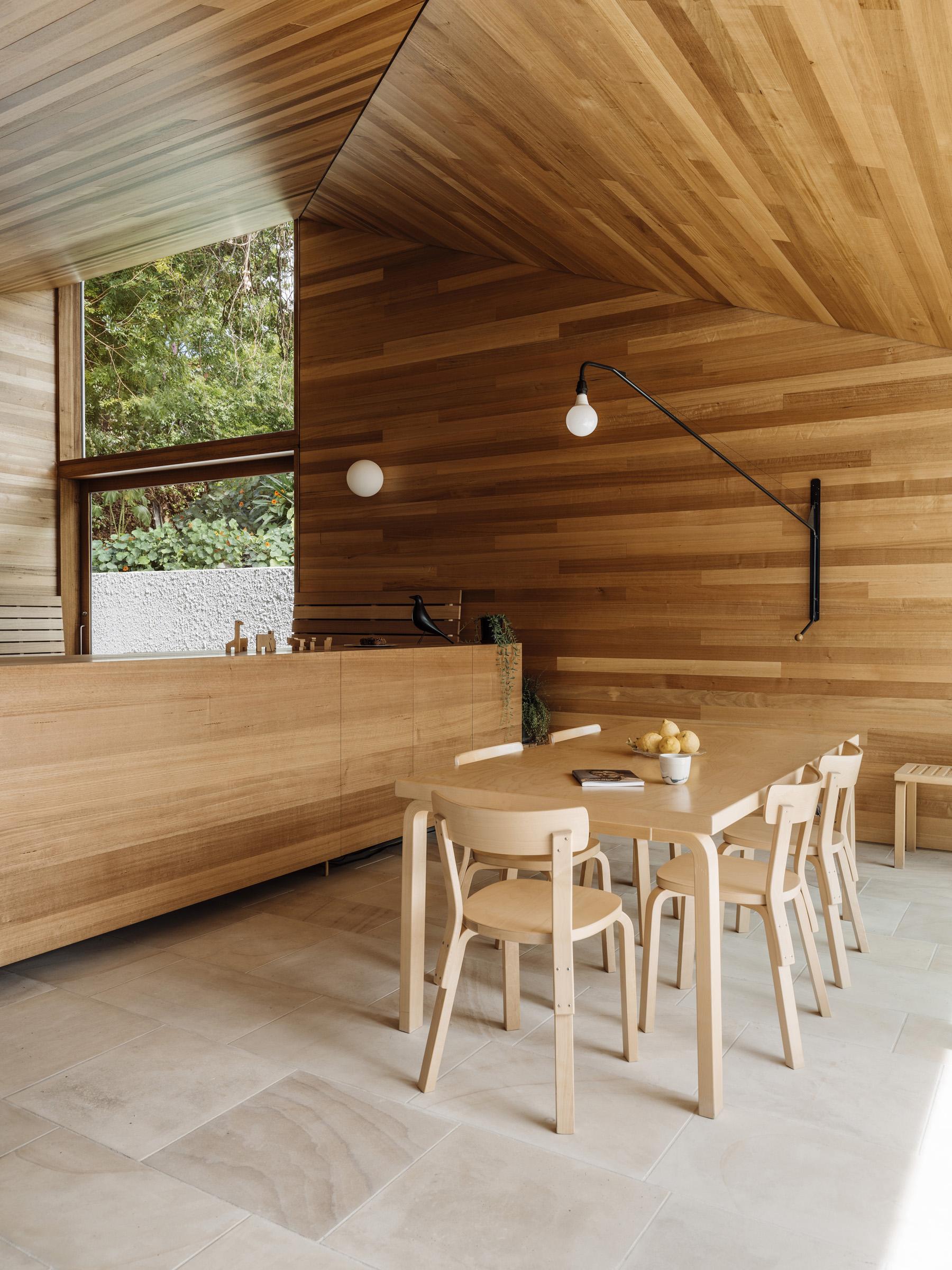 a room with a table and chairs