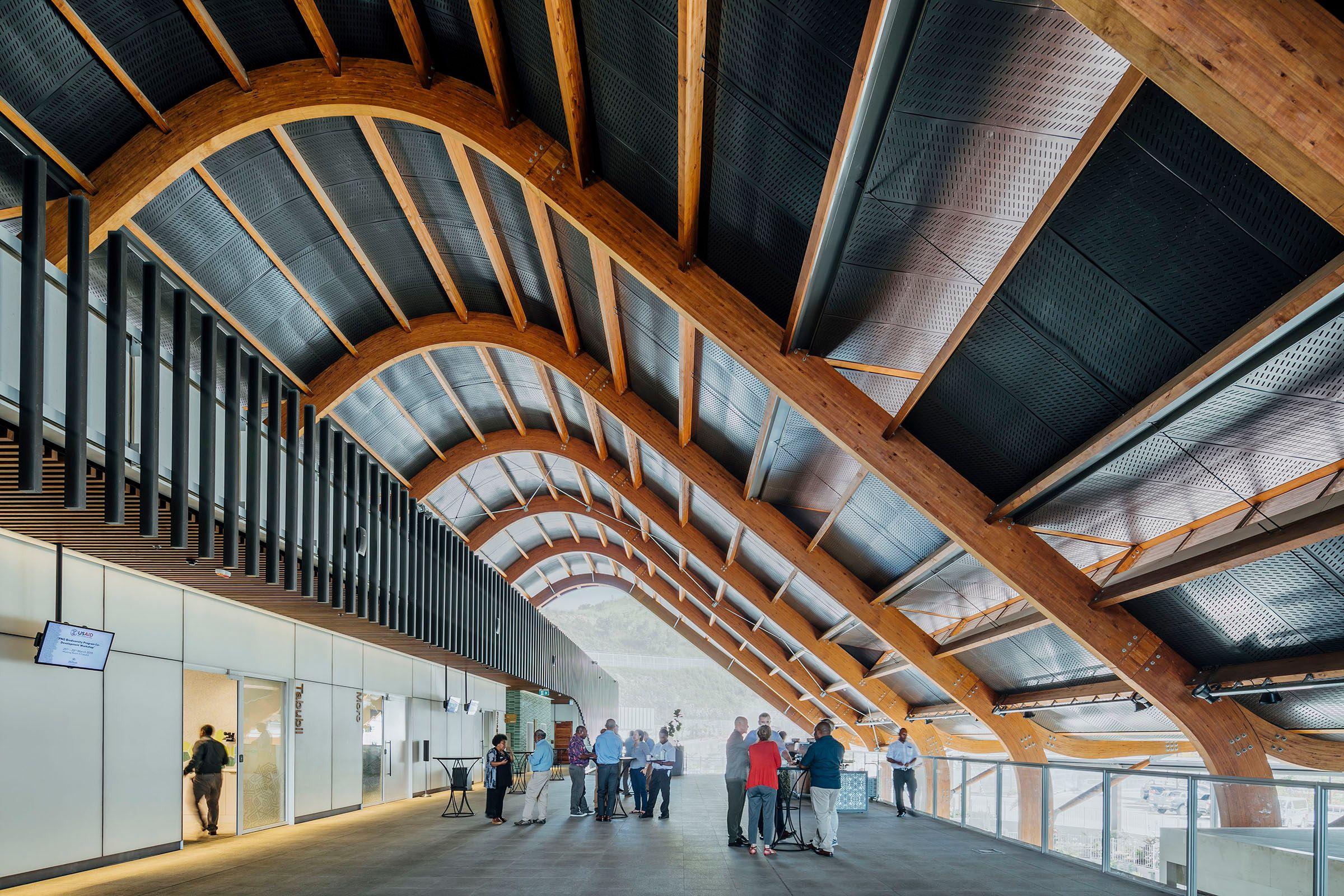 a group of people standing in a building