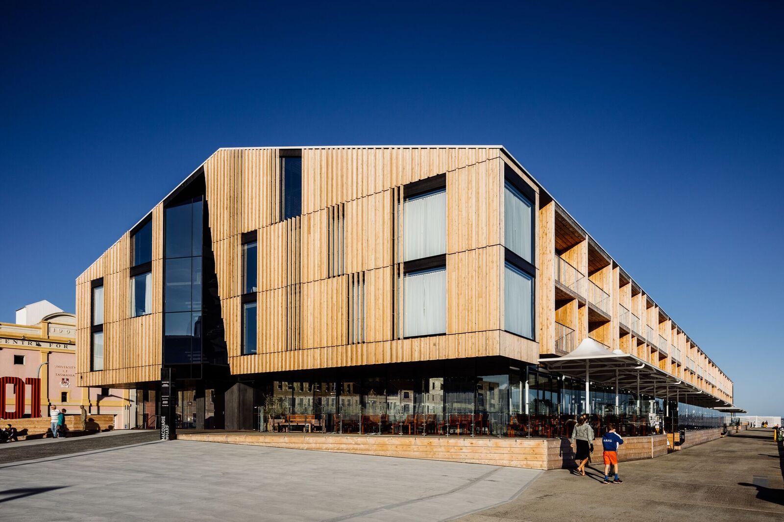 a building with a glass wall and a large glass wall