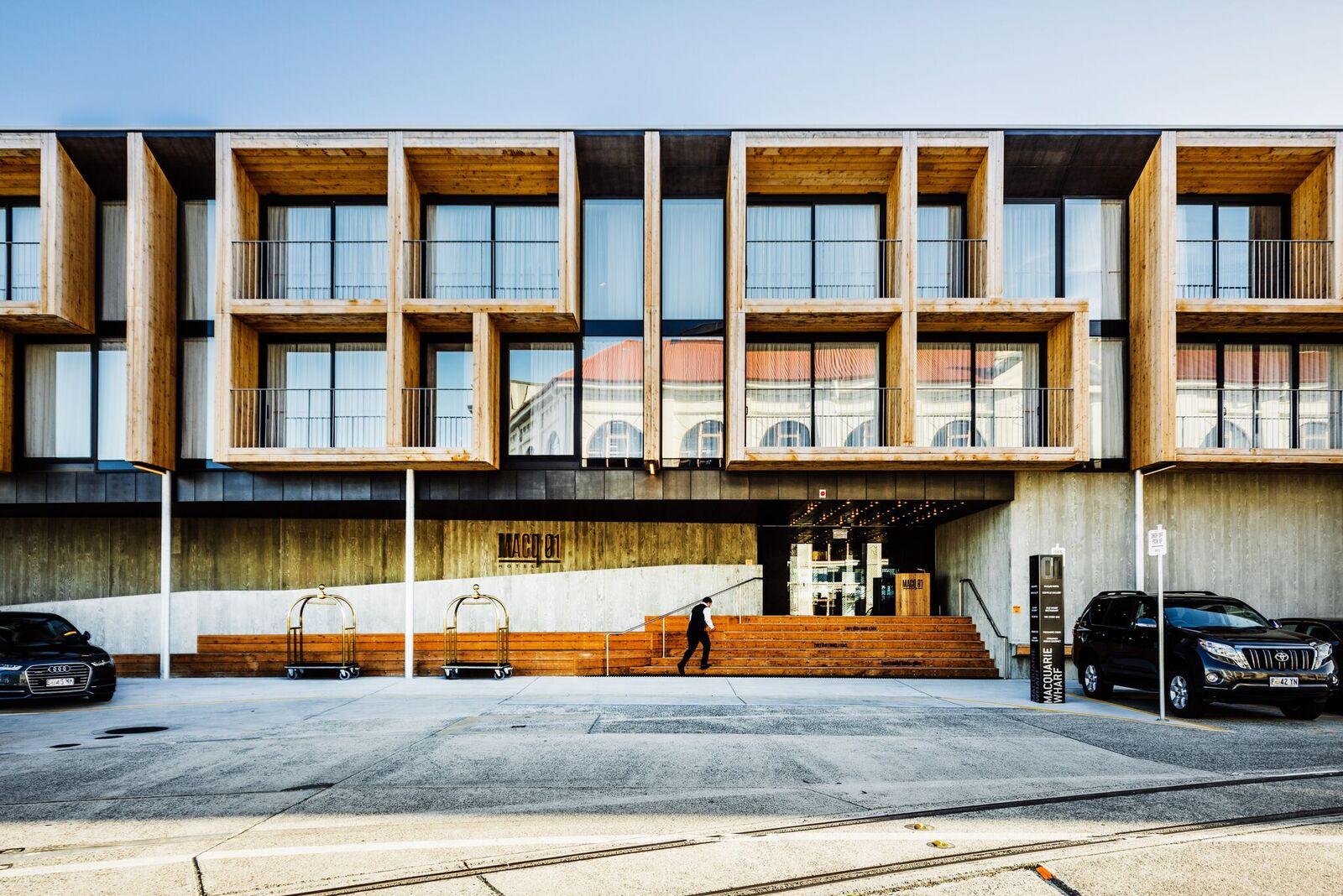 a building with a person walking up stairs