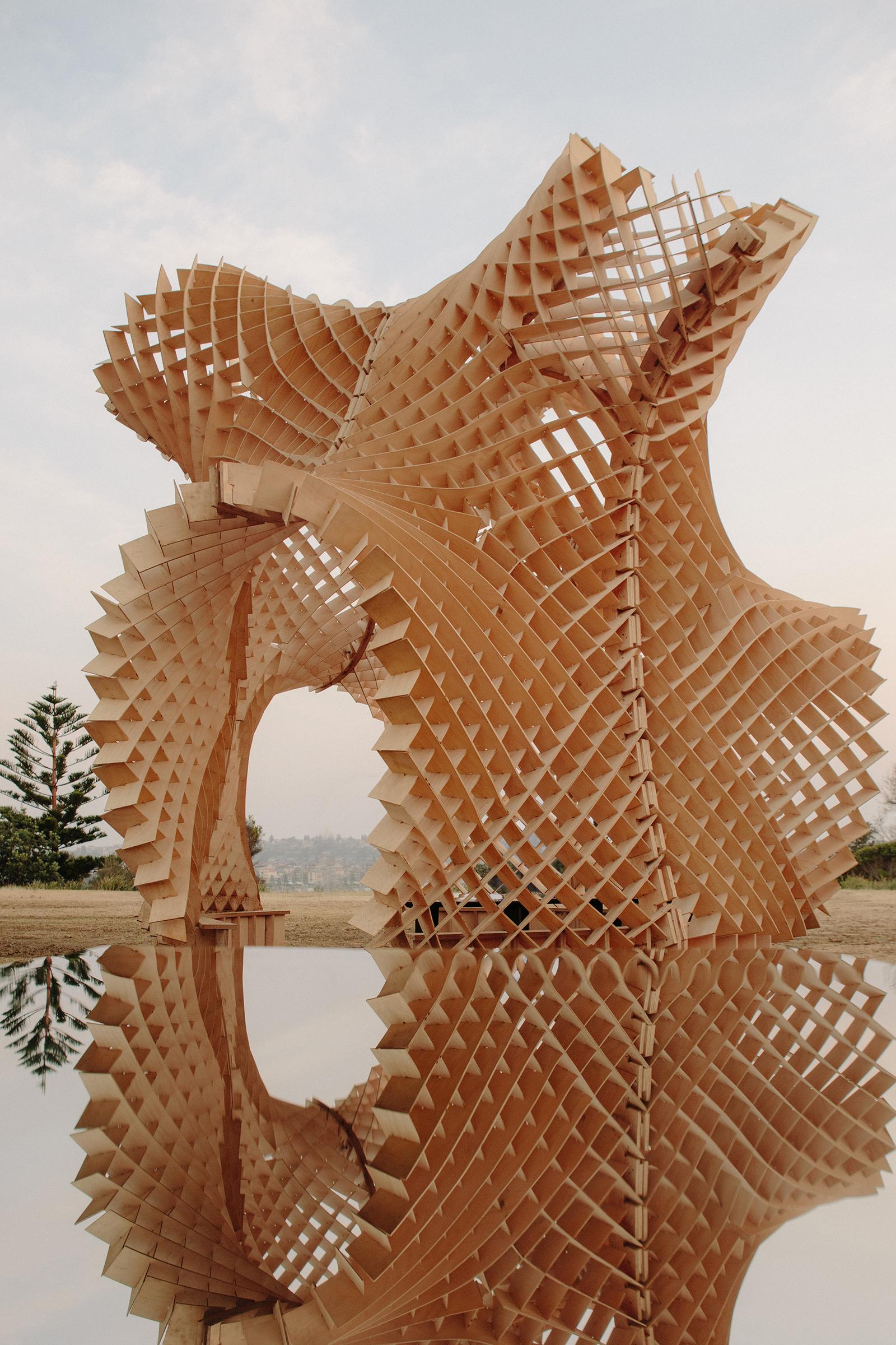 a large wooden structure with a large body of water