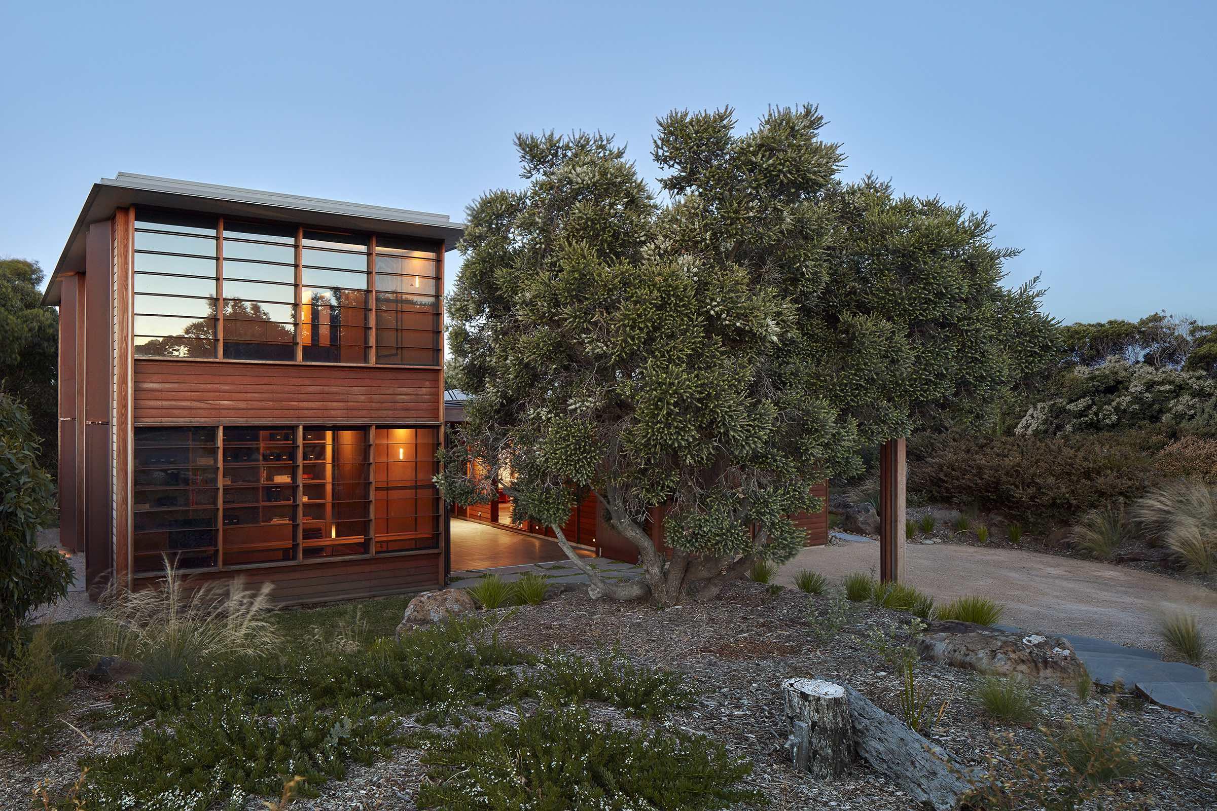 a house with a tree in the back