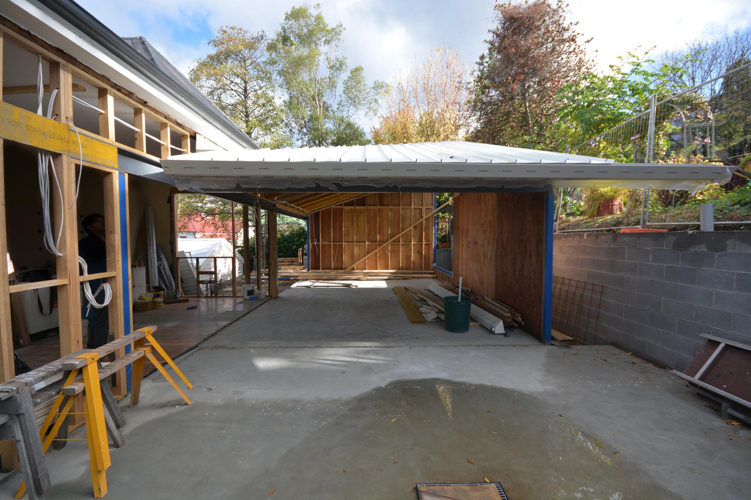 a building under construction with a roof