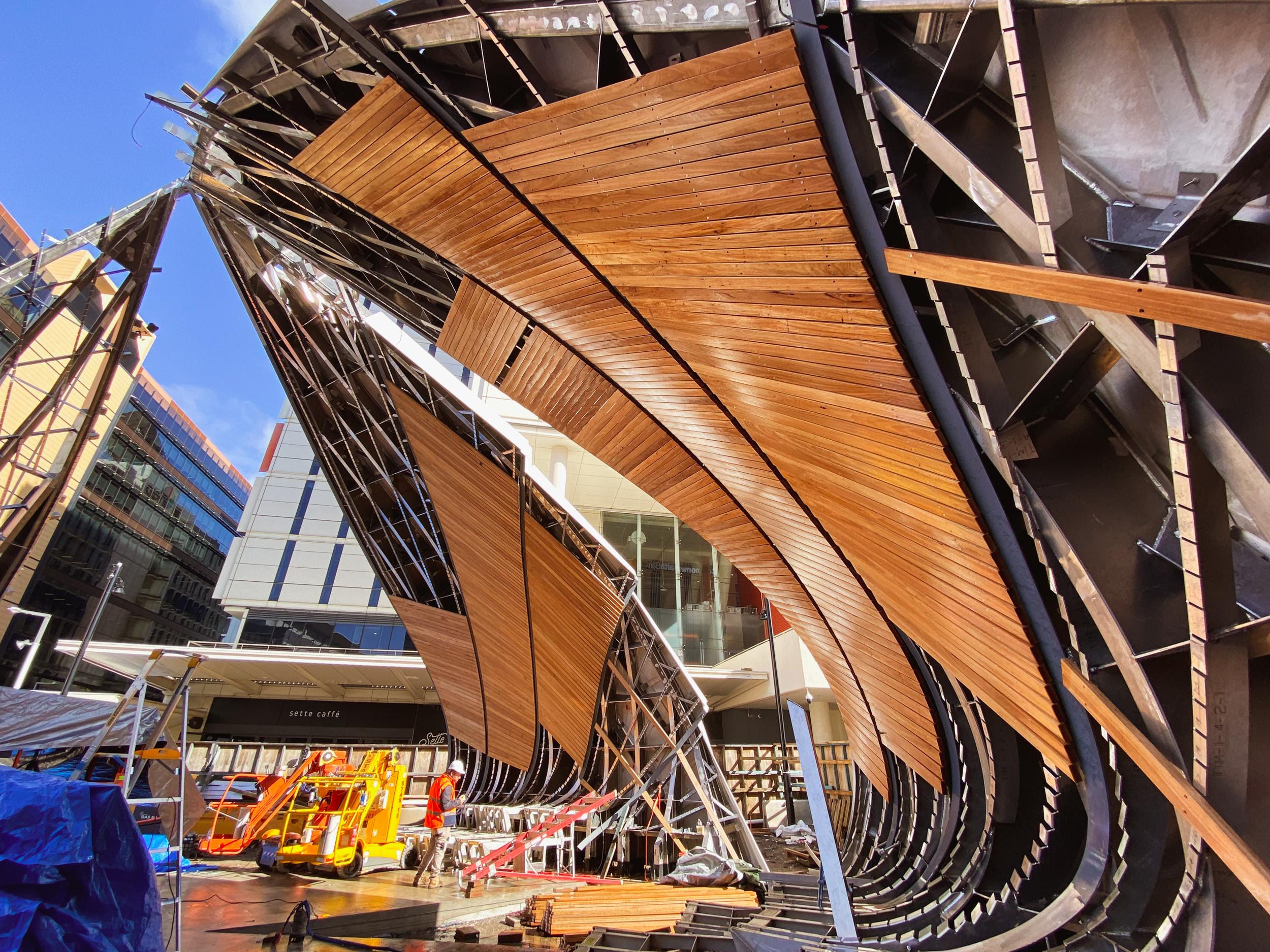 a building under construction with a large building