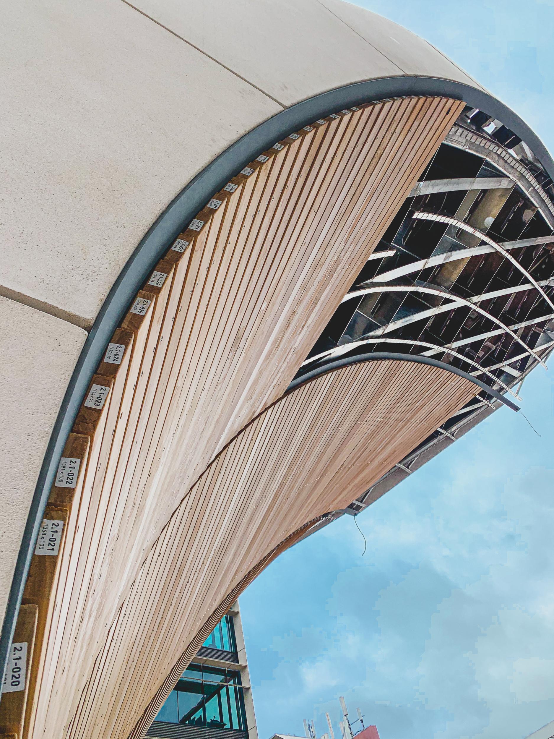 a curved building with a curved wall