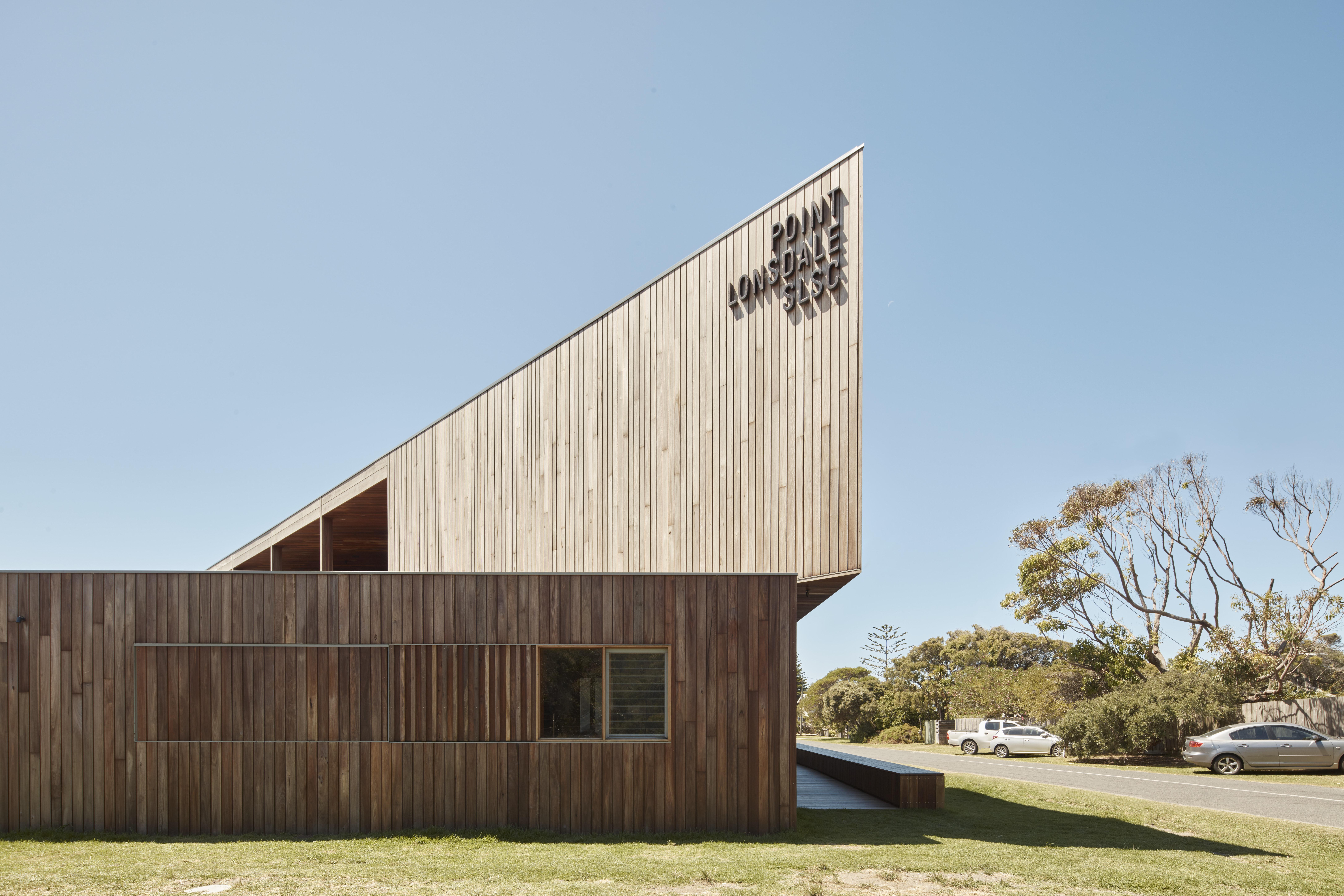 a building with a triangular shaped roof