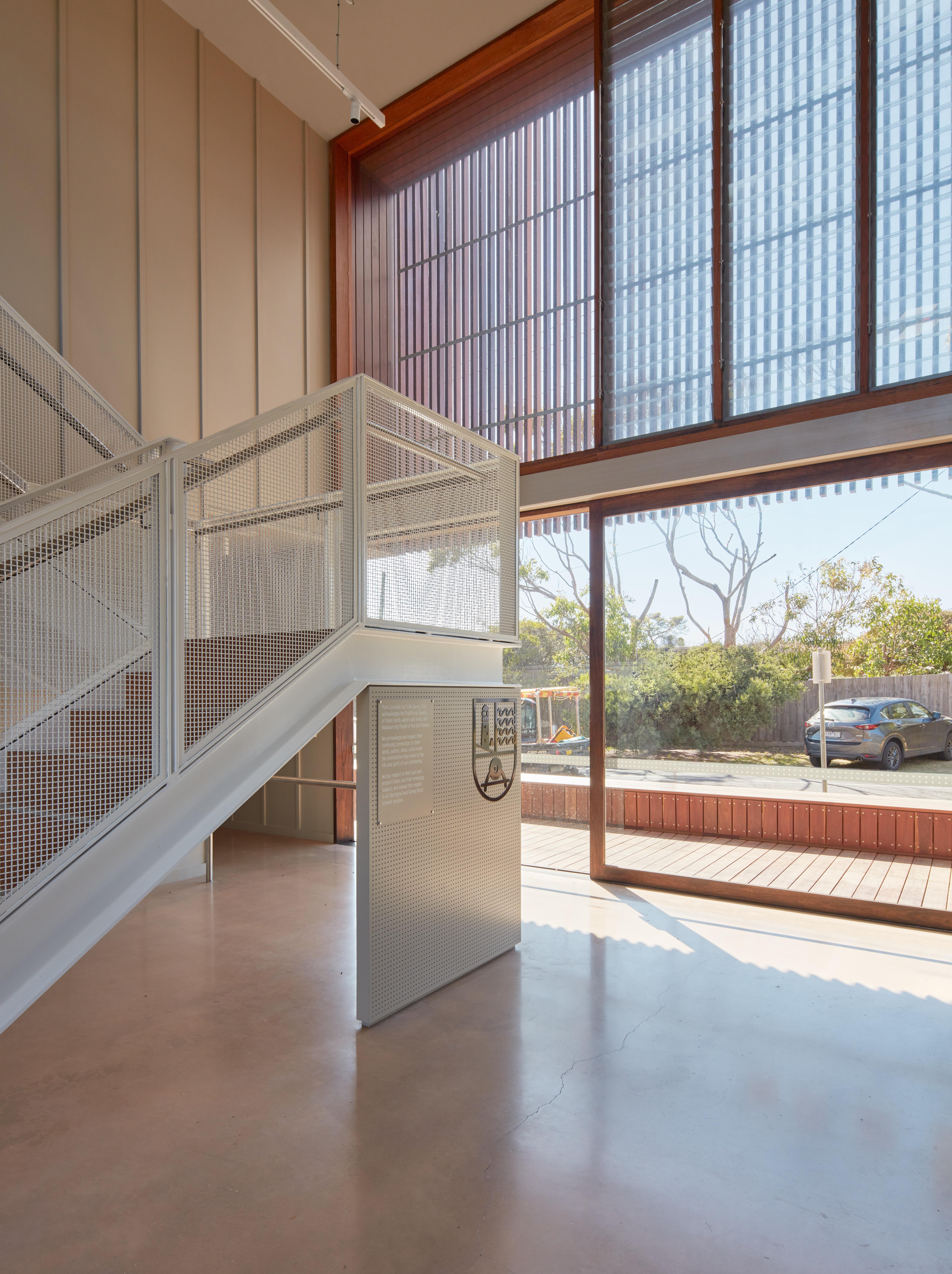 a white staircase in a building