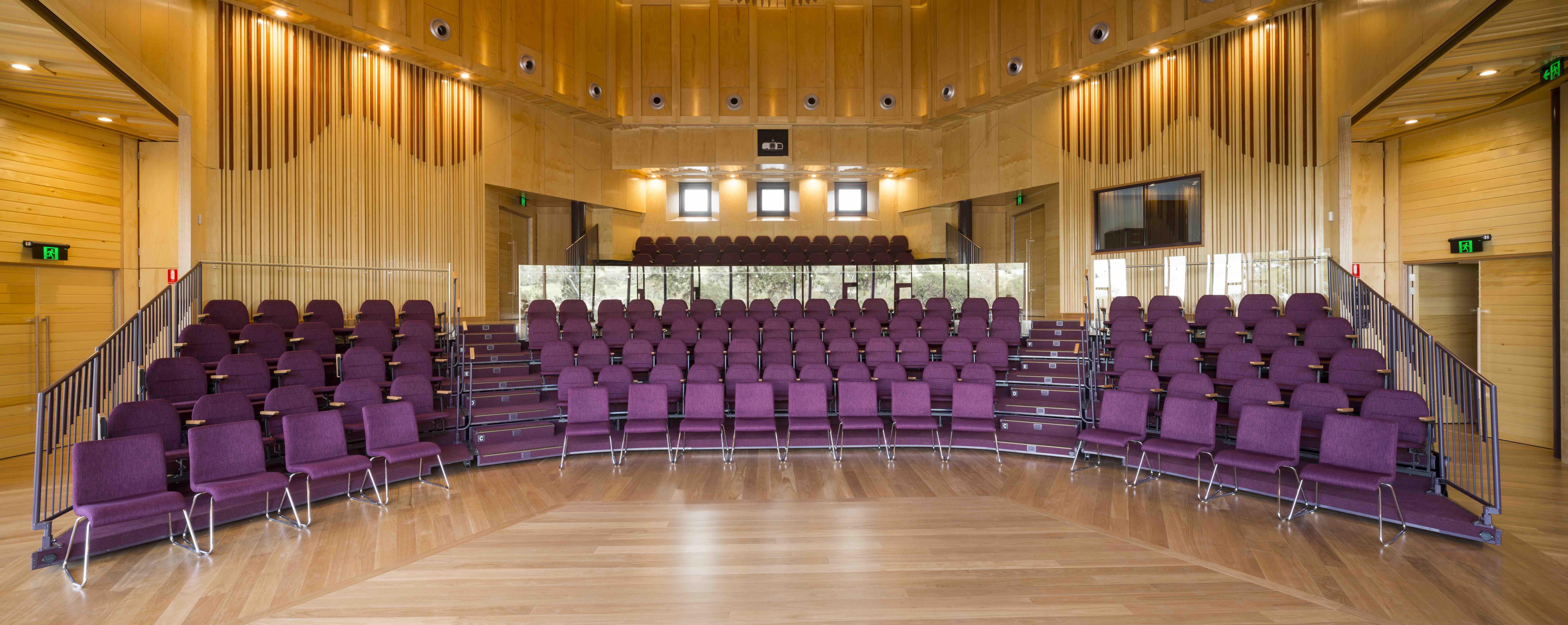 a room with purple chairs