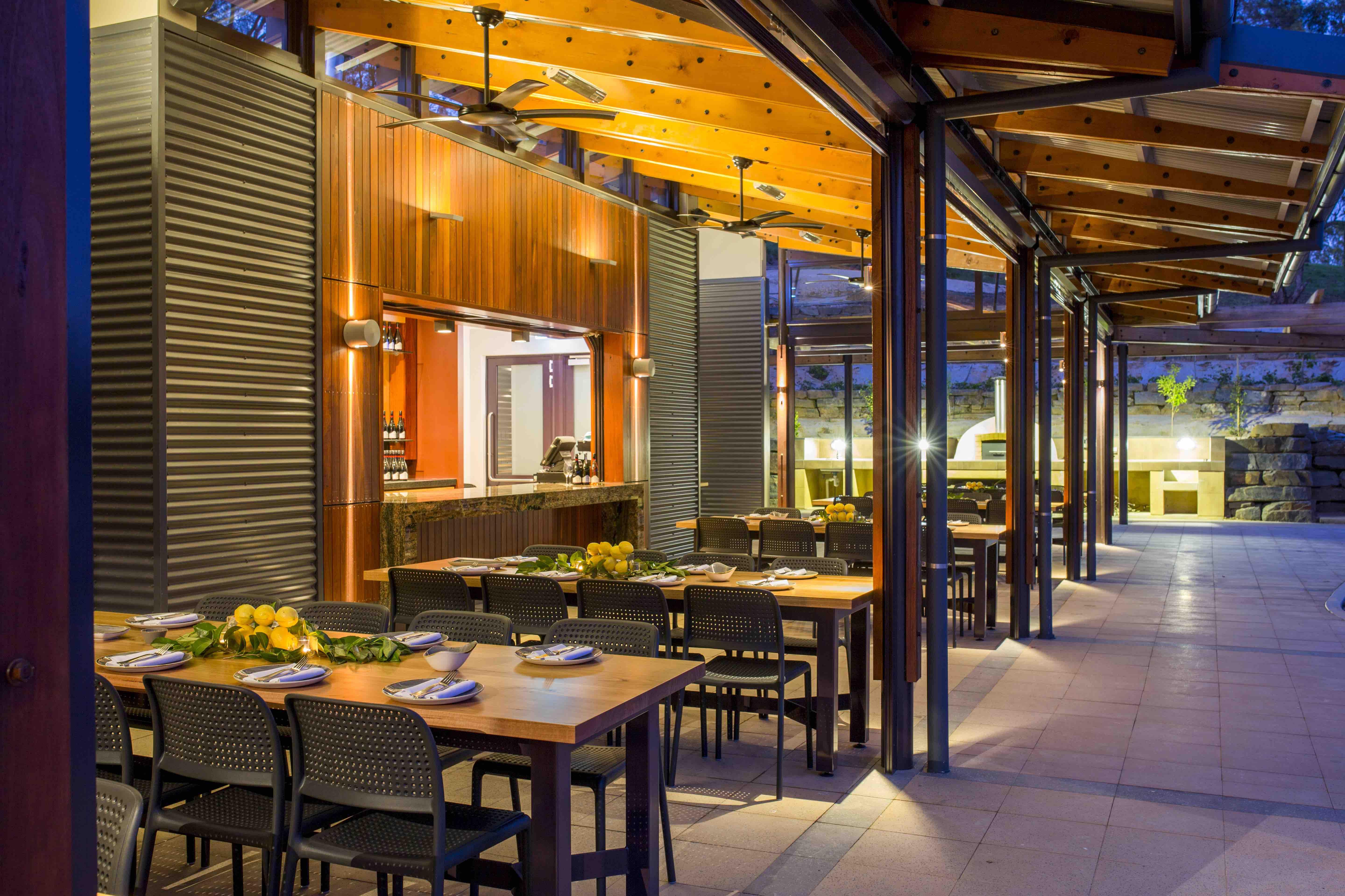 a restaurant with tables and chairs