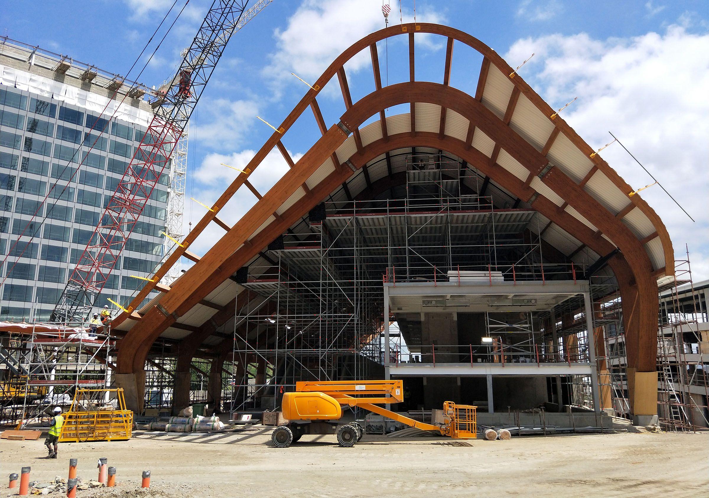 a building under construction with a crane