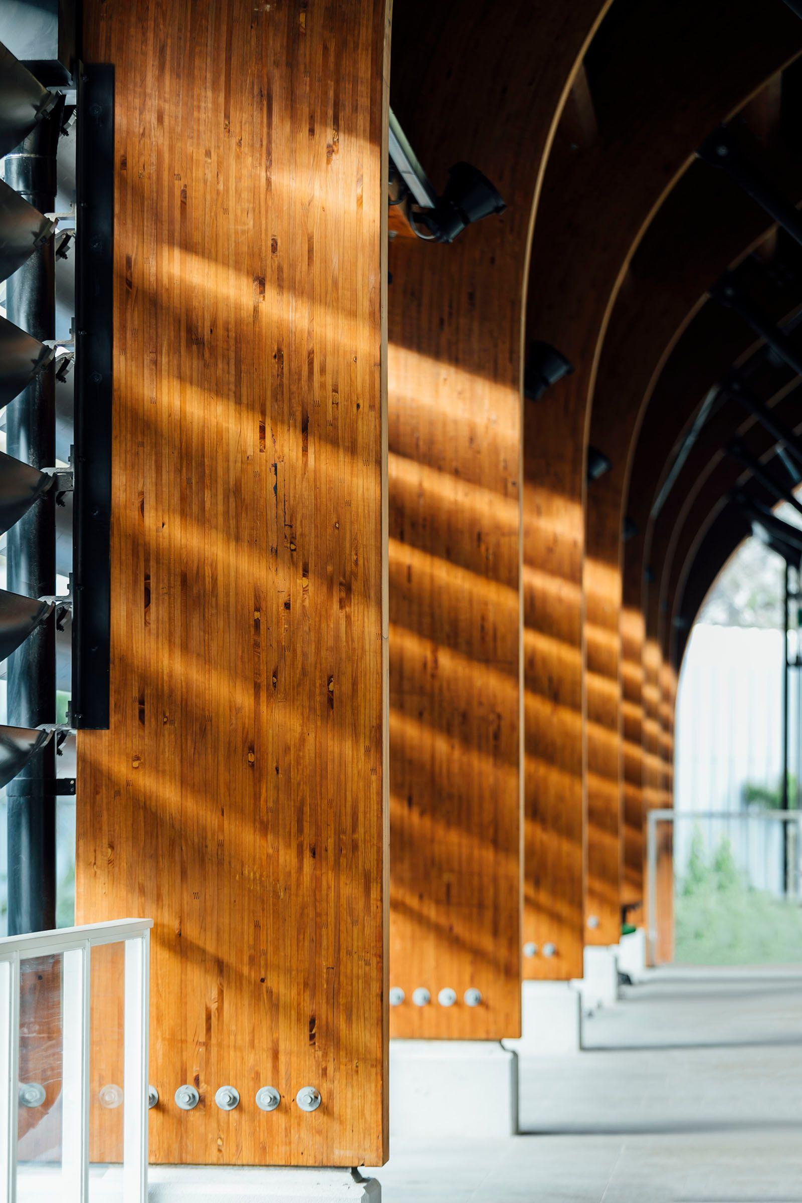 a row of wooden pillars