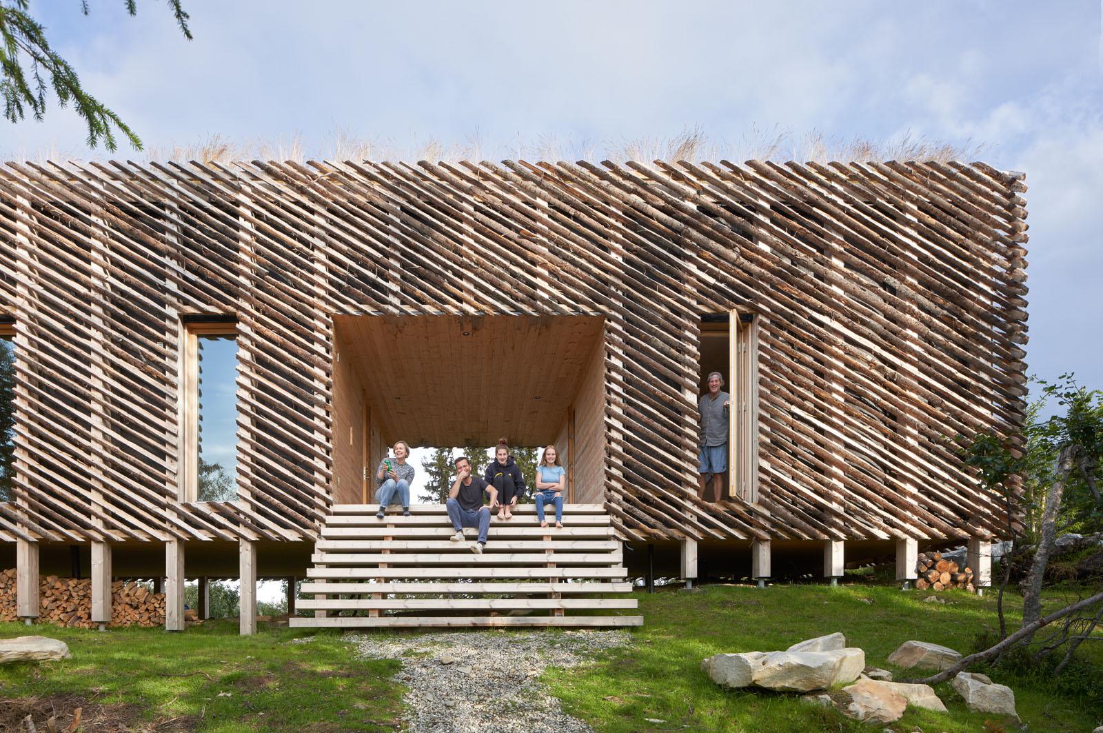 a group of people sitting on stairs outside a building