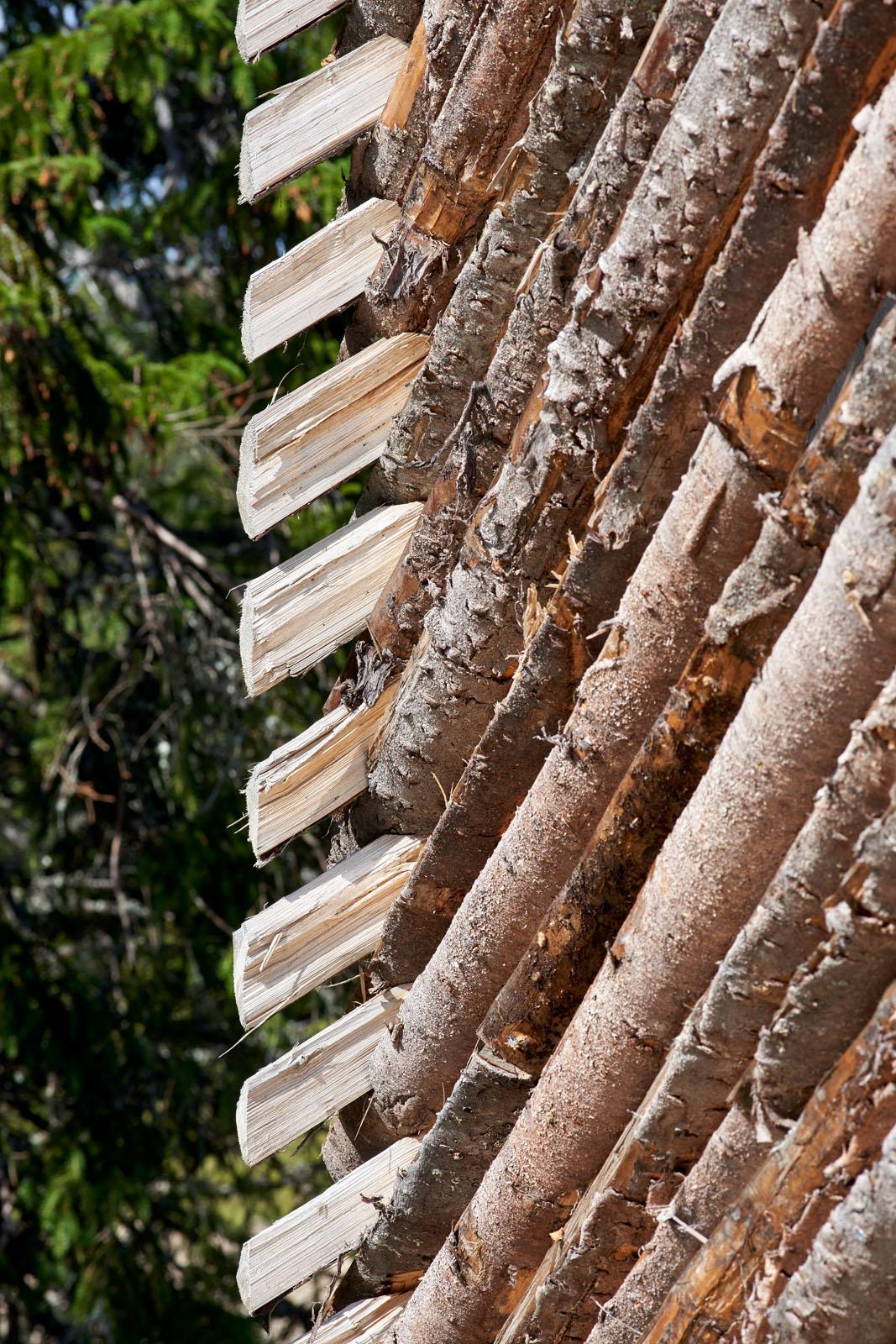 a close up of a log roof