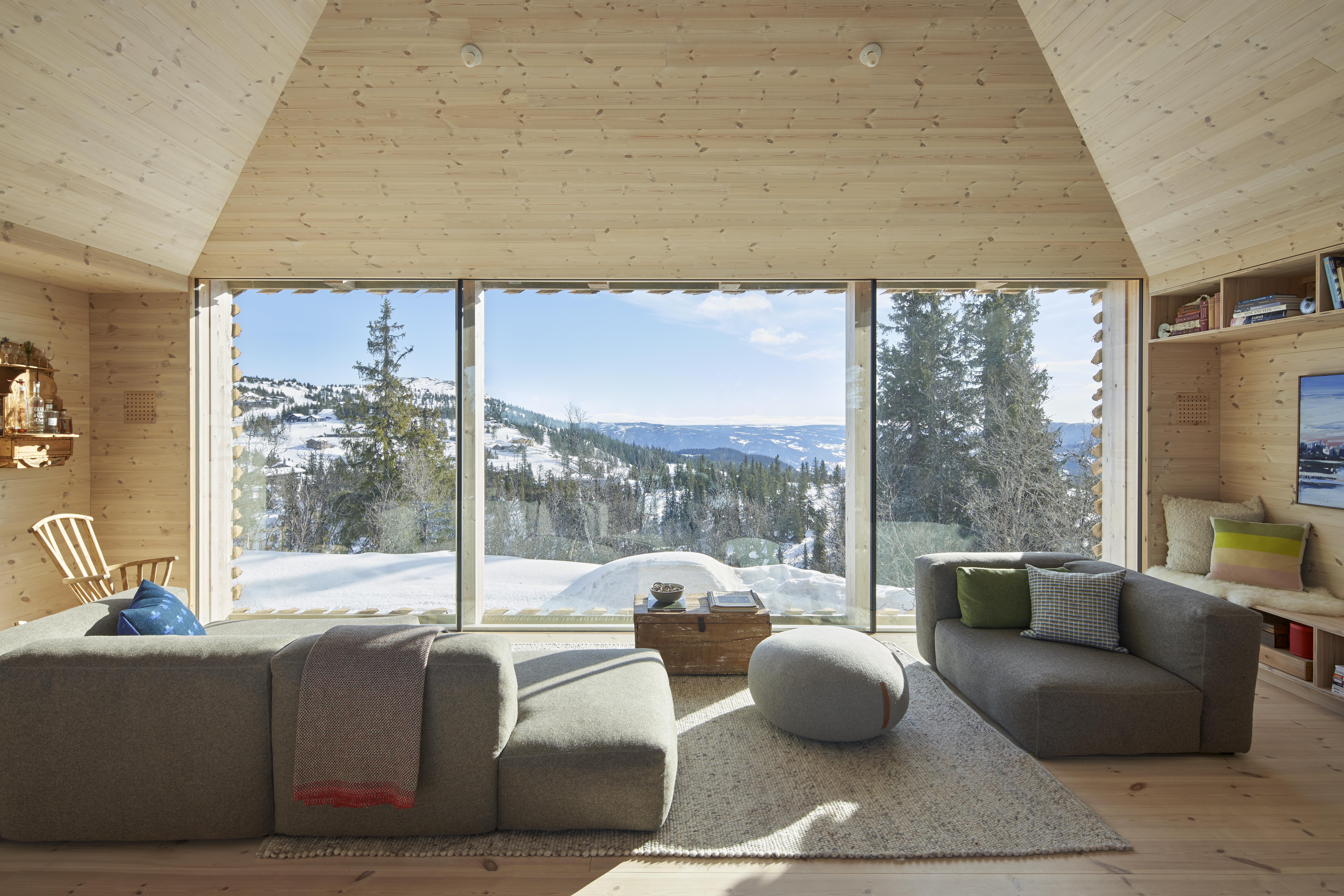 a room with a view of the mountains