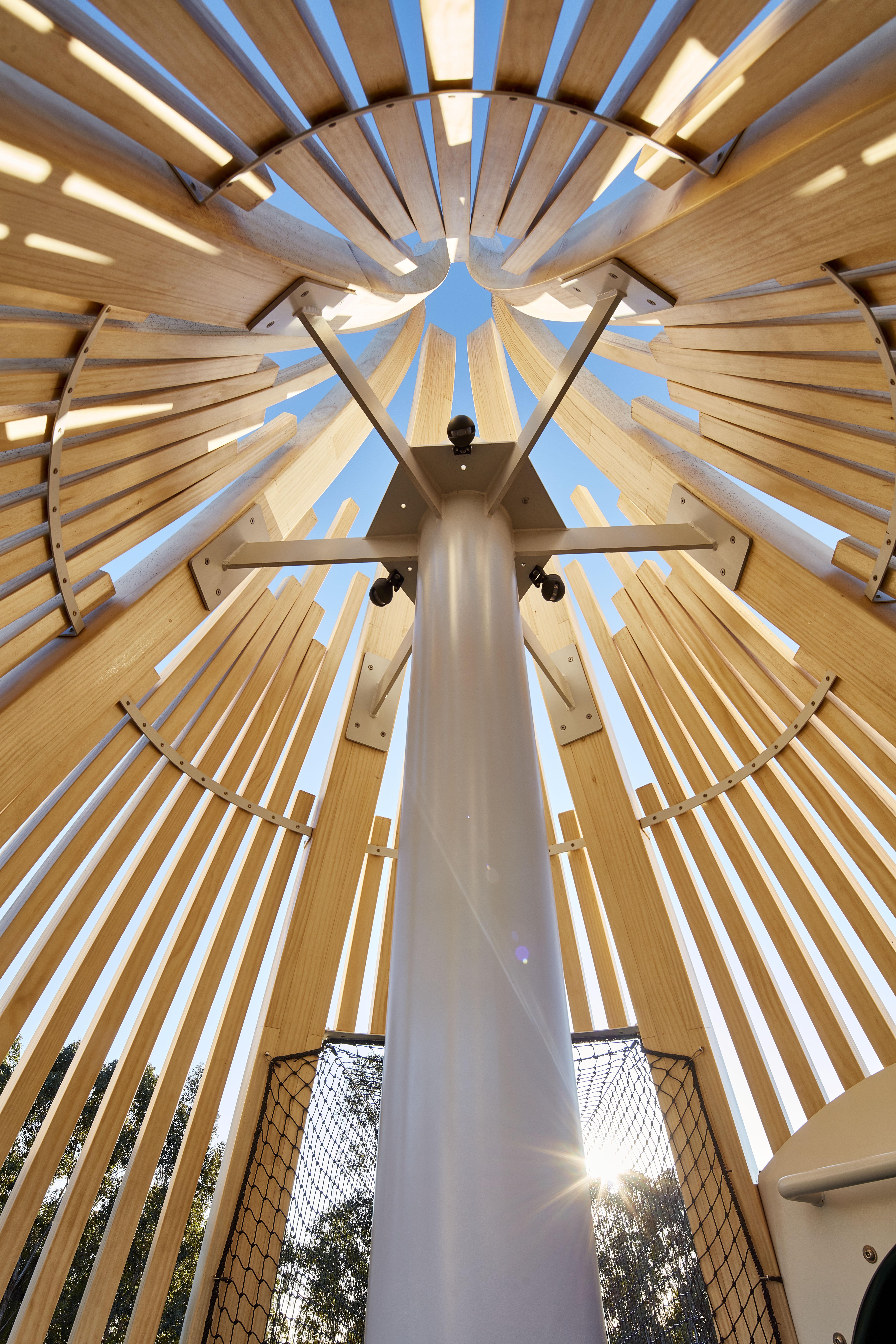 a metal pole with a blue sky