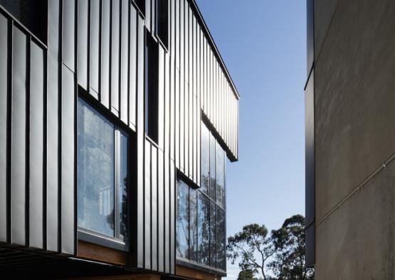 a building with a couple of people standing outside