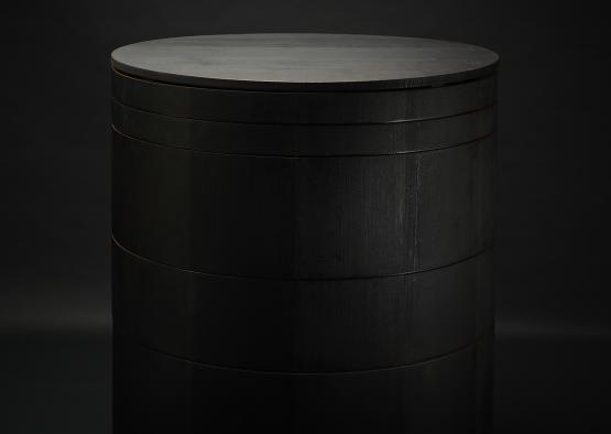 a black cylinder with a black background
