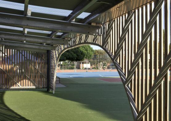 a sports field with a metal structure