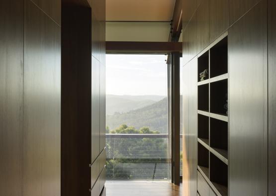 a hallway with a view of the mountains