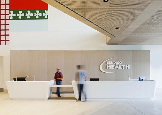 people standing in front of a reception desk