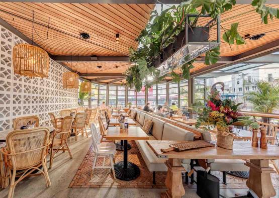 a restaurant with tables and chairs