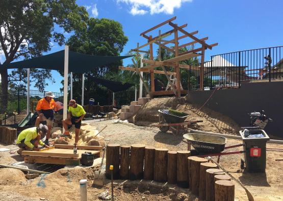 a group of people working on a construction site