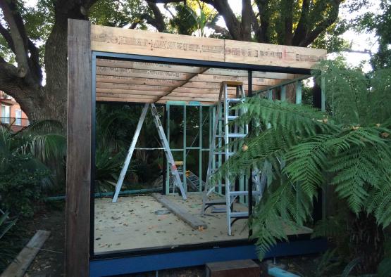 a building under construction in a forest