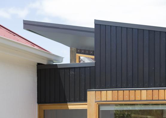 a black and brown siding on a building