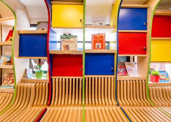 a colorful shelves in a room