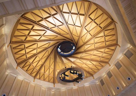 a circular ceiling with a spiral staircase