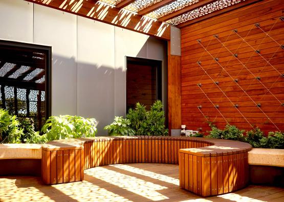 a wooden bench in a courtyard